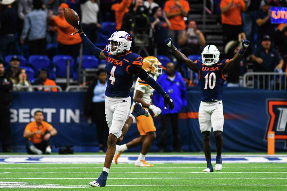 UTSA safety Clifford Chattman (4) celebrates a interception during the fourth quarter of Saturday’s Conference USA game against UTEP at the Alamodome.