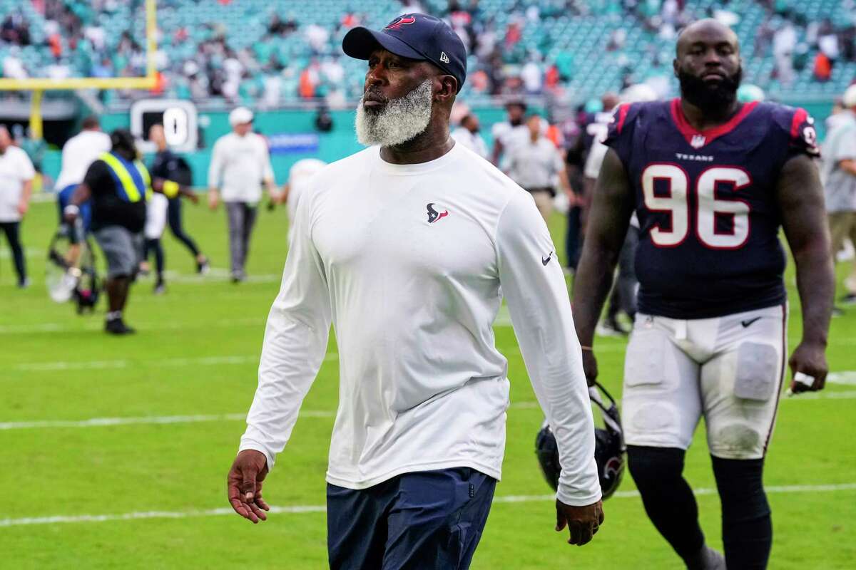 Houston Texans head coach Lovie Smith walks off the field after the Texans’ 30-15 loss to the Miami Dolphins during the second half of an NFL football game Sunday, Nov. 27, 2022, in Miami Gardens, Fla.
