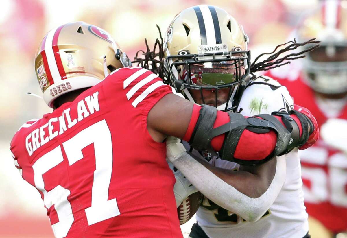 San Francisco 49ers’ Dre Greenlaw hits New Orleans Saints’ Alvin Kamara in 1st quarter during NFL game at Levi’s Stadium in Santa Clara, Calif., on Sunday, November 27, 2022.