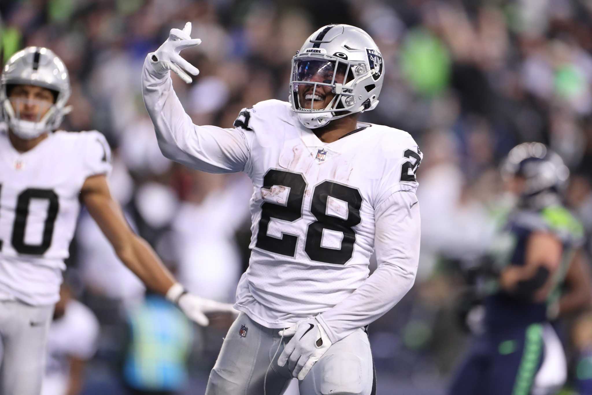 Touching moment Raiders running back Josh Jacobs surprises his dad with a  new house