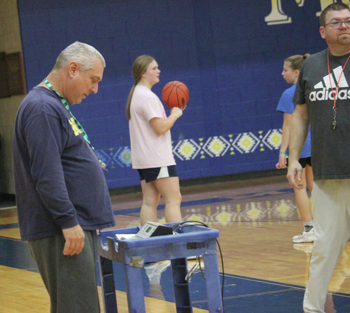 Morley Stanwood girls basketball coach Bob Raven sees how much time he has left recent in a practice session.