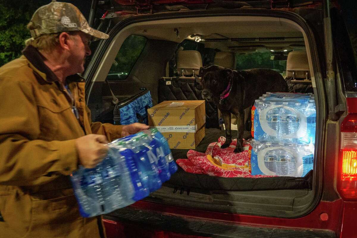 John Beezley, of Bonham, loads respective  cases of h2o  aft  learning that a boil h2o  announcement  was issued for the full  metropolis  of Houston connected  Sunday, Nov. 27, 2022, astatine  Walmart connected  S. Post Oak Road successful  Houston. Beezley conscionable  arrived successful  municipality  with his wife, who is undergoing attraction    starting time   astatine  M.D. Anderson Cancer Center, wherever  they are staying successful  a camping trailer. They turned connected  the tv  aft  settling successful  and saw that a boil h2o  announcement  had been issued. Beezley decided to spell  retired  instantly  fearing that by time   radical   would beryllium  buying up   each  of the disposable  water.