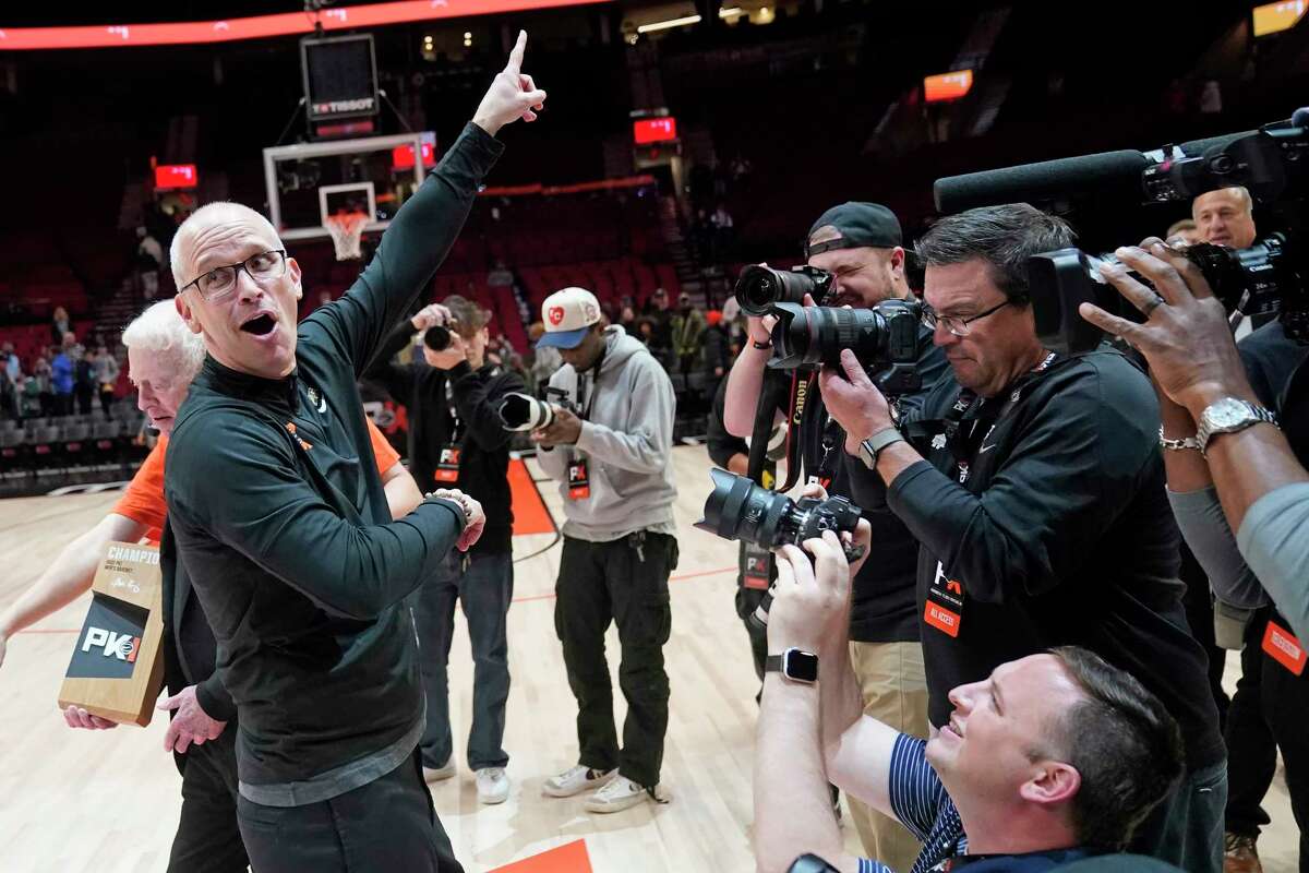 Connecticut head coach Dan Hurley celebrates after his team won the Phil Knight invitational championship game following an NCAA college basketball game Sunday, Nov. 27, 2022, in Portland, Ore.