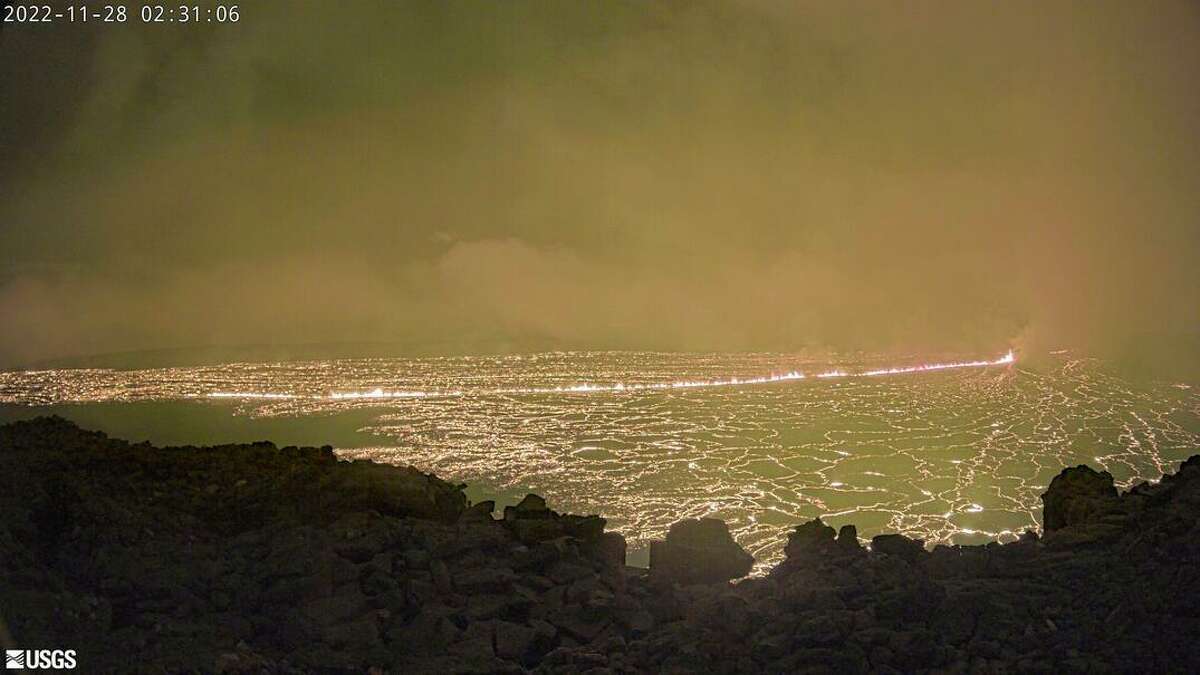 This image provided by the U.S. Geological Survey Hawaiian Volcano Observatory shows Hawaii’s Mauna Loa, the world’s largest active volcano, has started to erupt, prompting volcanic ash and debris to fall nearby. The U.S. Geological Survey says the eruption began late Sunday night in the summit caldera of the volcano on the Big Island. Early Monday, Nov. 28, 2022, it said lava flows were contained within the summit area and weren’t threatening nearby communities. 