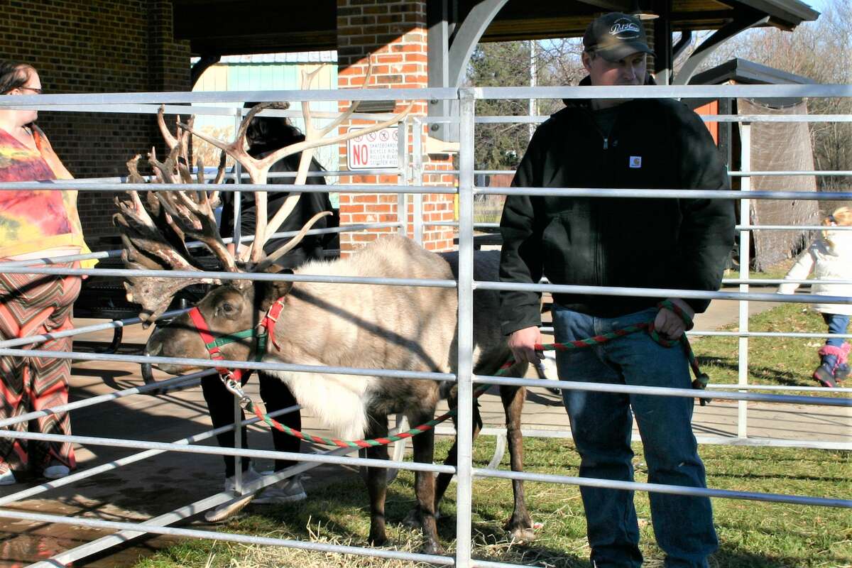 The annual Evergreen Festival in downtown Reed City kicked off the holiday season this past weekend with a holiday decorating contest, a lighted parade and visits with Santa and his reindeer.