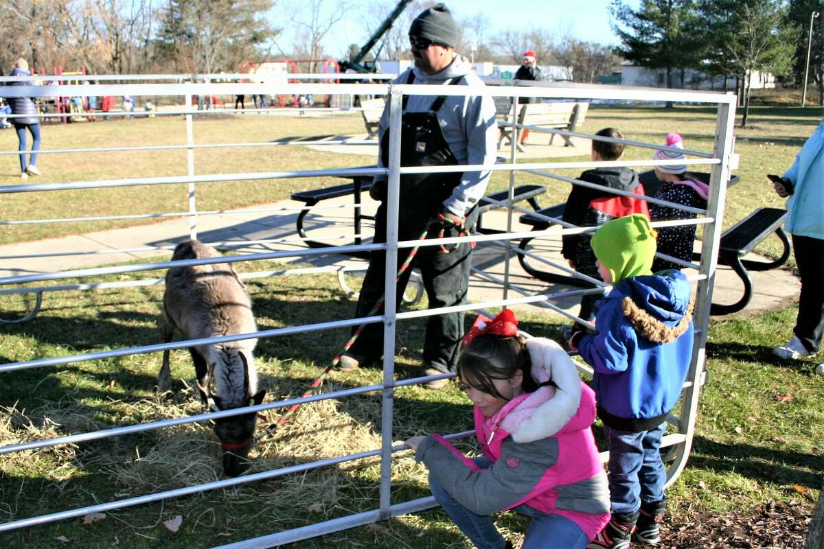 The annual Evergreen Festival in downtown Reed City kicked off the holiday season this past weekend with a holiday decorating contest, a lighted parade and visits with Santa and his reindeer.