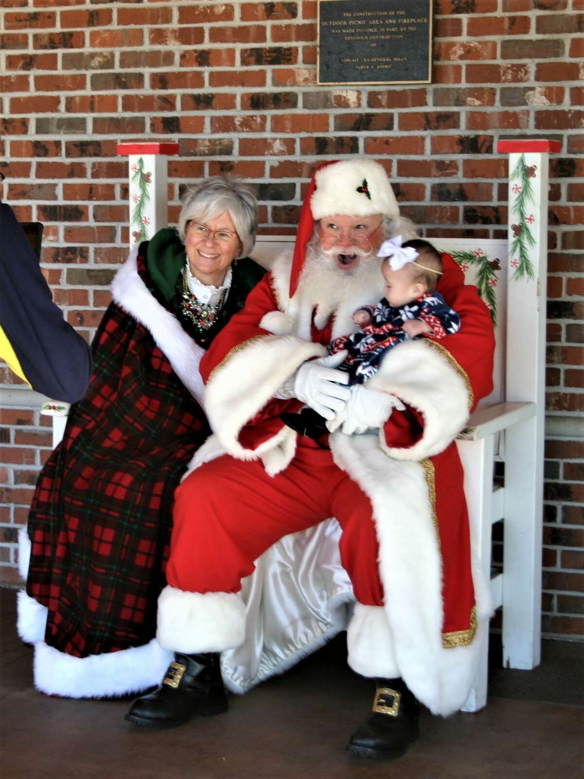 The annual Evergreen Festival in downtown Reed City kicked off the holiday season this past weekend with a holiday decorating contest, a lighted parade and visits with Santa and his reindeer.