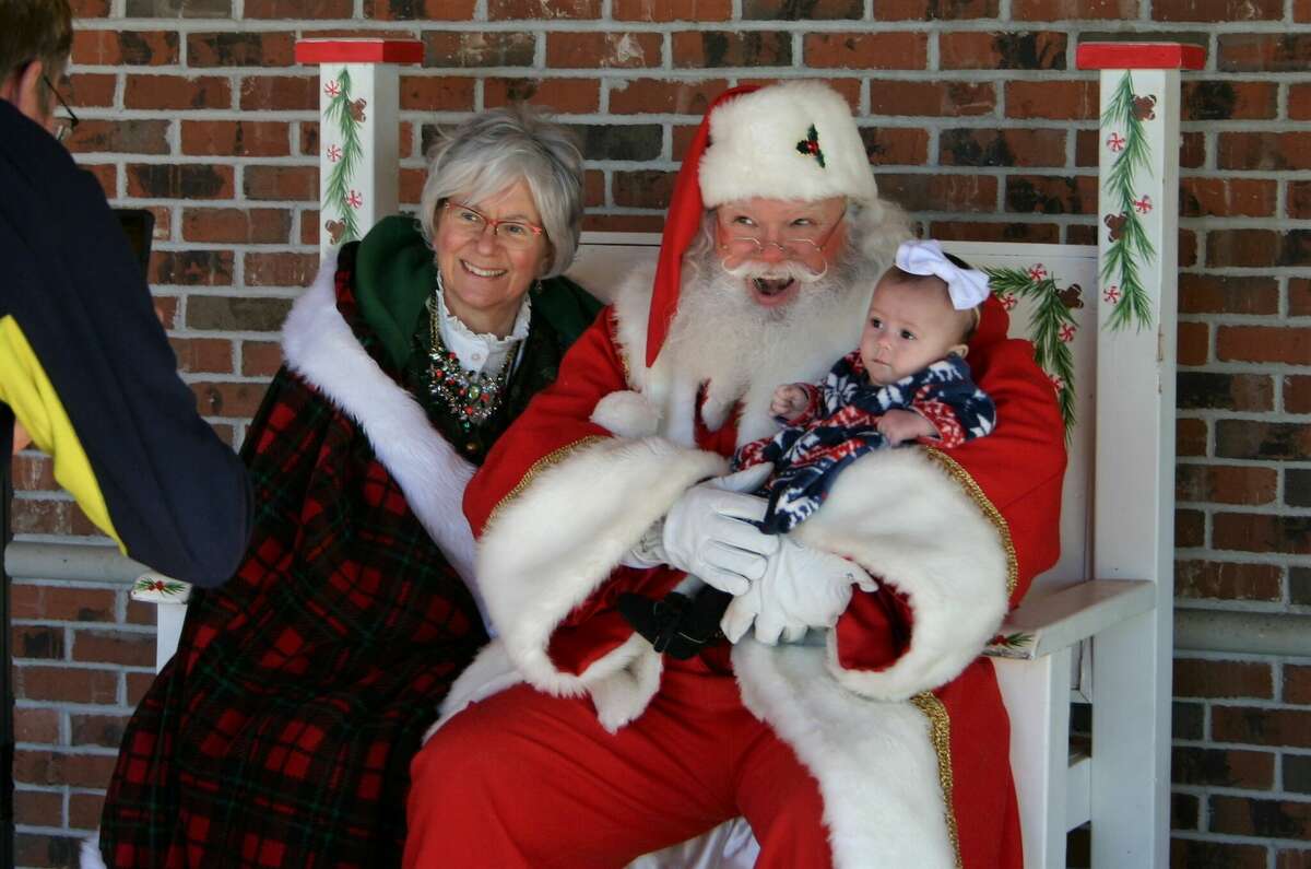 The annual Evergreen Festival in downtown Reed City kicked off the holiday season this past weekend with a holiday decorating contest, a lighted parade and visits with Santa and his reindeer.