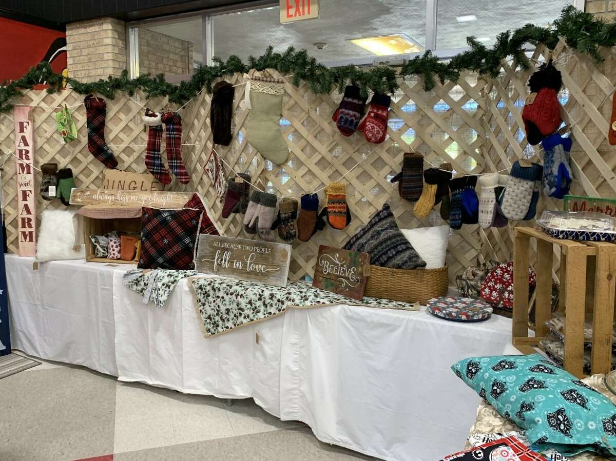 The annual Evergreen Festival in downtown Reed City kicked off the holiday season this past weekend with a holiday decorating contest, a lighted parade and visits with Santa and his reindeer.