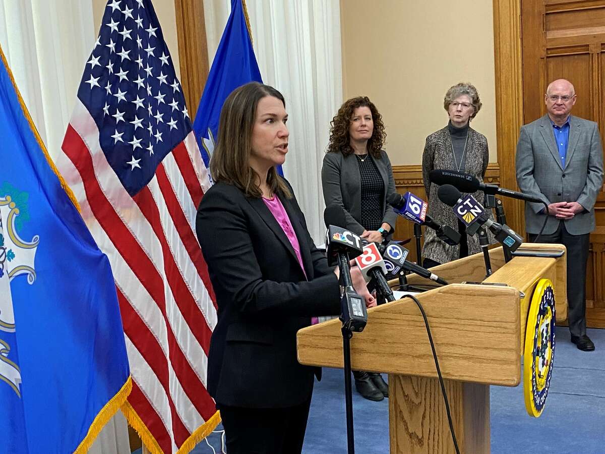 Consumer Counsel Claire Coleman speaking at an energy assistance press conference. Coleman said electric ratepayers who currently receive standard offer service can reduce their monthly bills by switching to a third party provider.