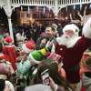 Milford Mayor Ben Blake, Santa Claus and his elves, and Milford children fill the gazebo on the Milford Green for the annual tree lighting in Milford, Conn. on Friday, November 25, 2022.