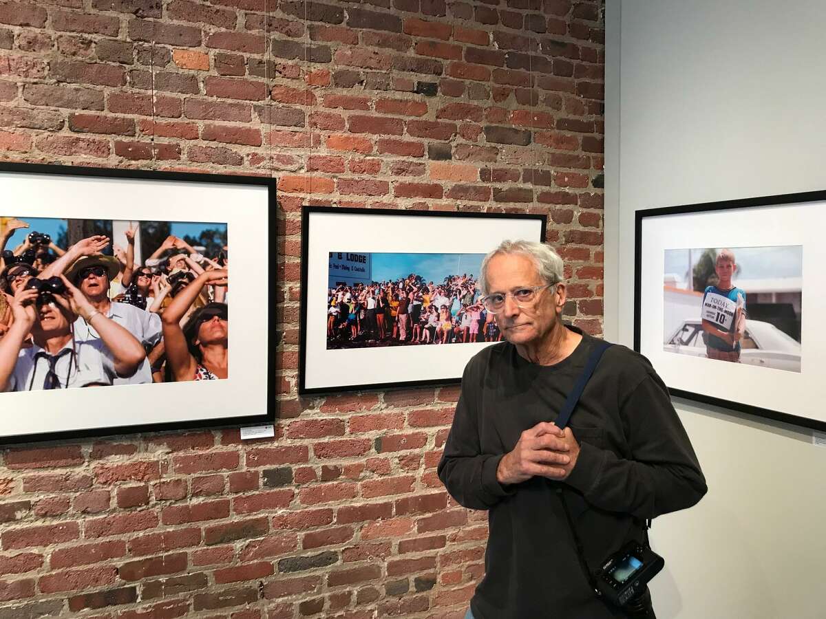 David Burnett with his exhibition “We Choose to go to the Moon,” in the Gallery at Leica Store San Francisco