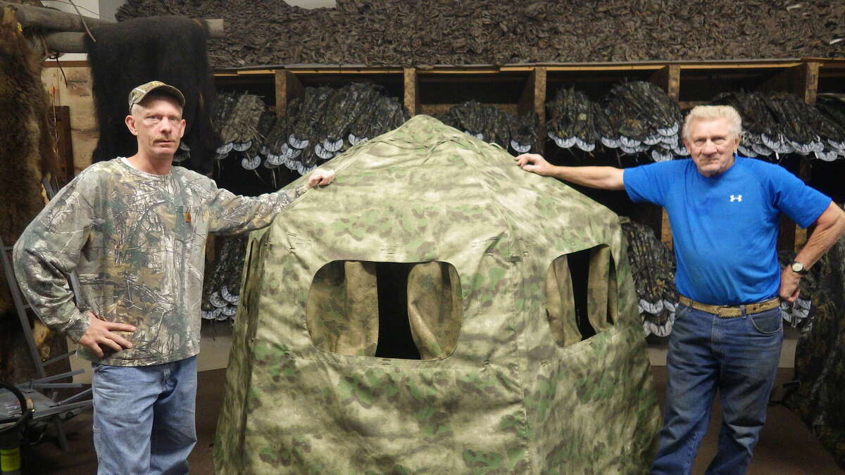 Bob Peruski Jr. (left) and Bob Peruski Sr. show off their highly popular and dependable Lucky Hunting Blind.