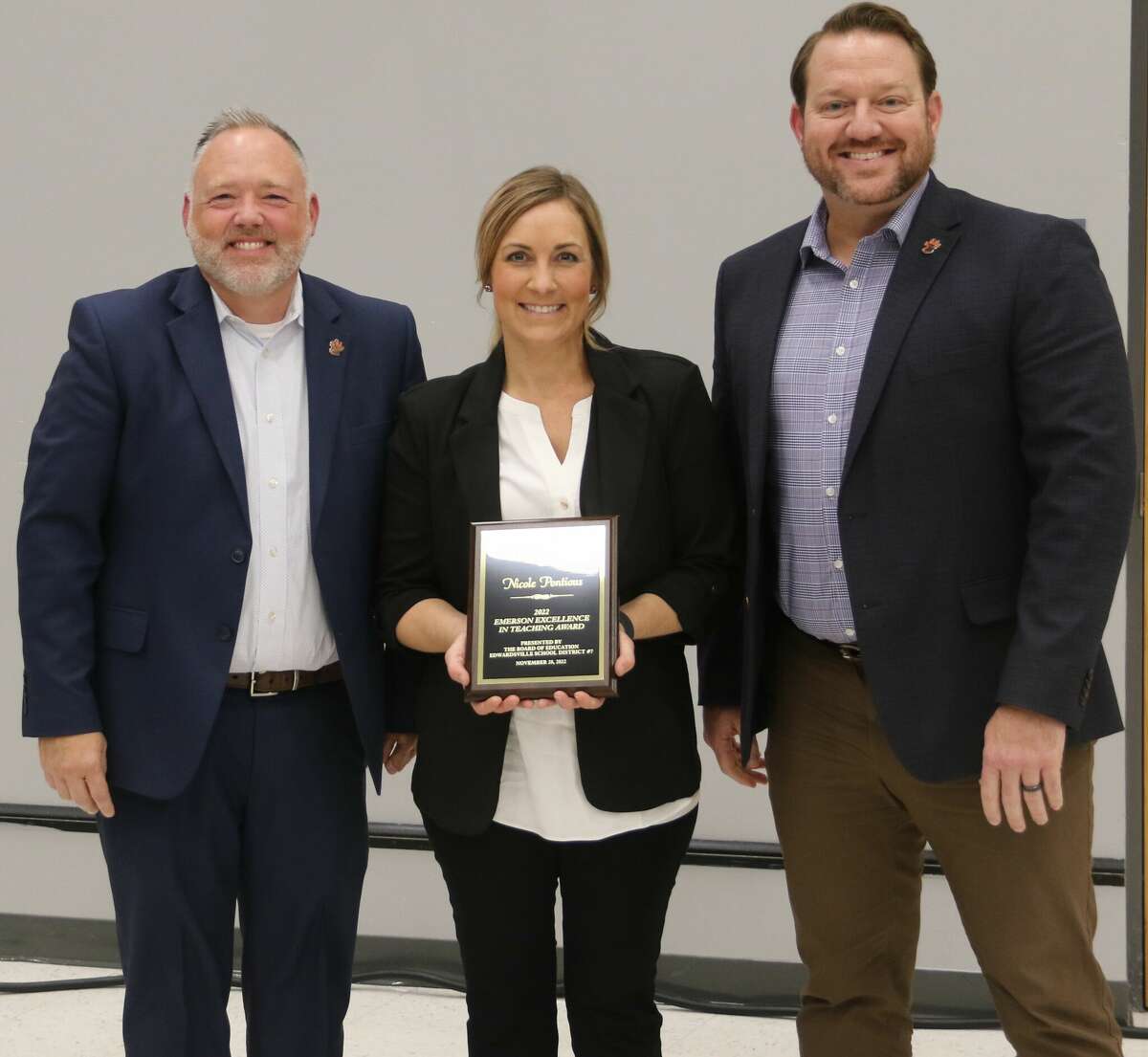 Nickie Pontious, center, was honored Monday as an Emerson 2022 Excellence in Teaching Award recipient. With her are District 7 Superintendent Dr. Patrick Shelton, left, and Board of Education President John McDole.
