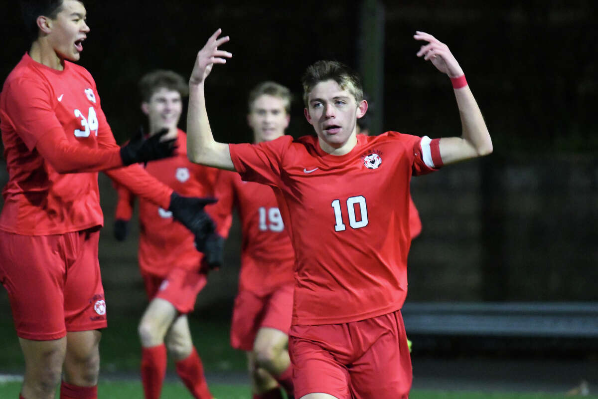 Cheshire's Samir Dishnica celebrates his goal during the Class L boys soccer state championship between Cheshire and Xavier at Trinity Health Stadium on Sunday, Nov. 30, 2022.
