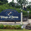 The Village of Devon sign at the intersection of Bridgeport Ave. and Rivercliff Dr., in Milford, Conn. June 22, 2022.