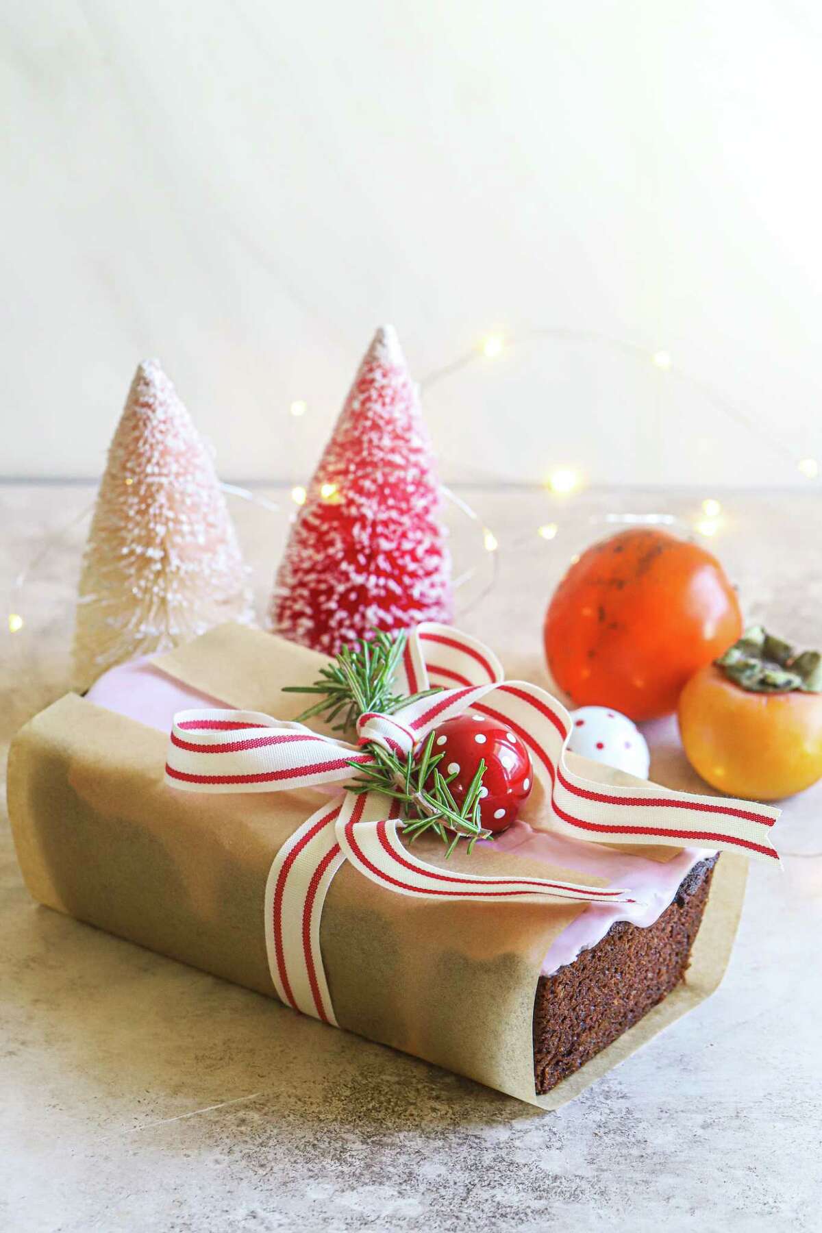 Persimmon & Gingerbread Loaf With Pomegranate Glaze makes a wonderful holiday gift.