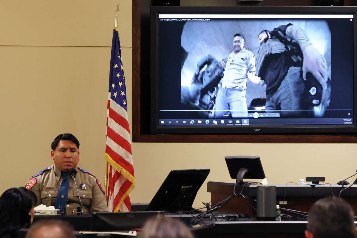 Texas Department of Public Safety Troop Abiel Obregon as body camera video shows the arrest of Juan David Ortiz, during Ortiz's capital murder trial before Webb County District Judge Oscar J. Hall, Monday, Nov. 28, 2022. Ortiz is accused in the murders of four women in in September 2018. He is facing live without the possibility of parole if found guilty. The trial was moved from Laredo to San Antonio. Obregon was the trooper who handcuffed the suspect at the time of the arrest.