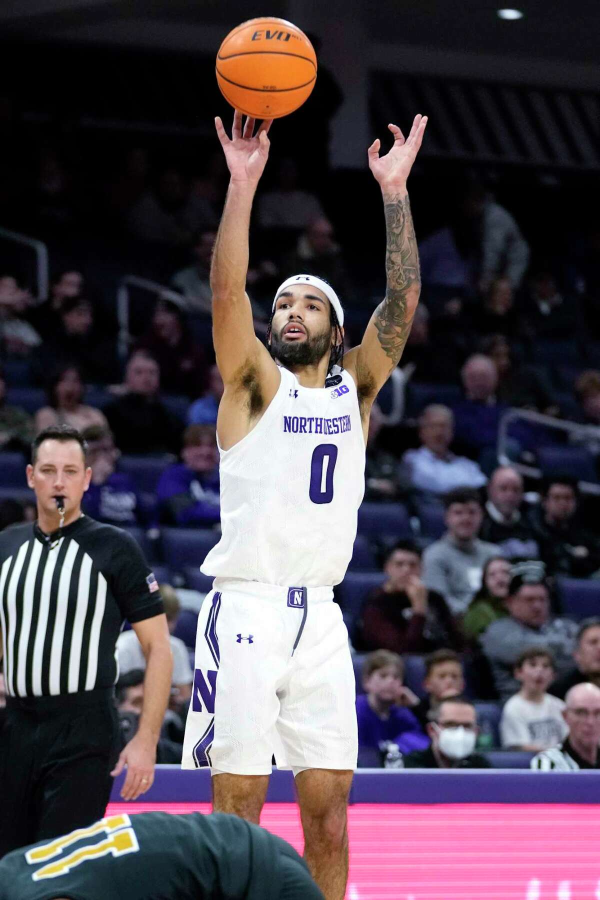 Northwestern guard Boo Buie (0) shoots against Purdue Fort Wayne during the second half of an NCAA college basketball game in Evanston, Ill., Friday, Nov. 18, 2022. (AP Photo/Nam Y. Huh)