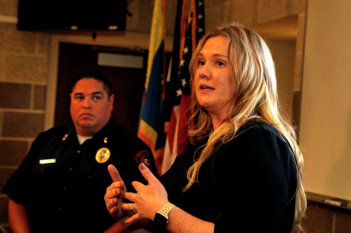 Kendall County District Attorney Nicole Bishop,with Boerne Police Chief Steve Perez in background who are speaking regarding a gymnastics probe at Police Dpt./Municipal Ct.In Boerne, TX on Tuesday, Nov. 29, 2022.