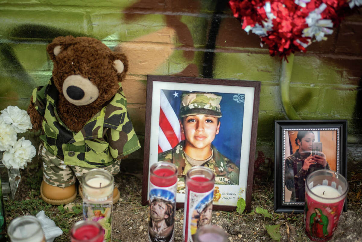 AUSTIN, TX - JULY 06: People pay respects at a mural of Vanessa Guillen, a soldier based at nearby Fort Hood on July 6, 2020 in Austin, Texas. A suspect in the disappearance of Guillen, whose remains were found in a shallow grave, faced a judge Monday morning. (Photo by Sergio Flores/Getty Images)
