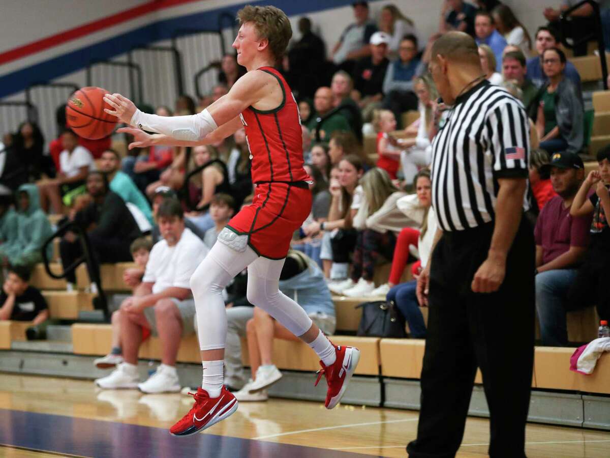 Eberwein's 30 points leads The Woodlands over Oak Ridge