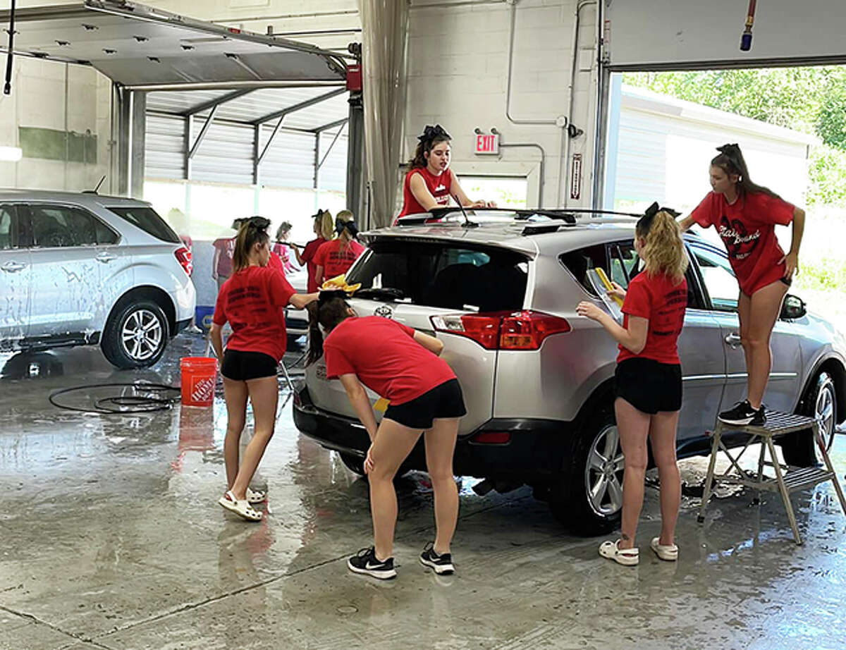 In June, the Triad High School (THS) cheerleaders participated in the annual “Soaps It Up” car wash at CARSTAR Maryville. The event raised more than $3,100 for the Cystic Fibrosis Foundation and the THS Cheerleading Organization.