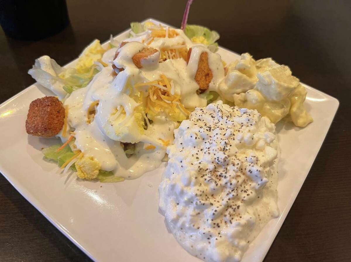 The salad bar at Alex's Railside Restaurant includes various salad toppings, pasta and potato salads and cottage cheese, just to name a few items.