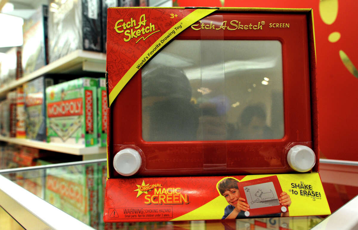 An "Etch A Sketch " is for sale at FAO Schwarz in New York City on March 22, 2012. French electrician AndrÃ© Cassagnes created the toy in the late 1950s as the "L'Ecran Magique," and with the Ohio Art Company launched it in the US on July 12, 1960. The iconic toy has found its way to US presidential politics. Republican presidential hopeful Mitt Romney received backing from major Republican figures March 21 after a big win in Illinois, but an aide's gaffe reinforced qualms about his campaign. Asked on CNN whether the primary had pushed Romney too far to the right for general election voters, advisor Eric Fehrnstrom said "I think you hit a reset button for the fall campaign. Everything changes." "It's almost like an Etch A Sketch. You can kind of shake it up and restart all over again." AFP PHOTO / TIMOTHY A. CLARY (Photo credit should read TIMOTHY A. CLARY/AFP via Getty Images)