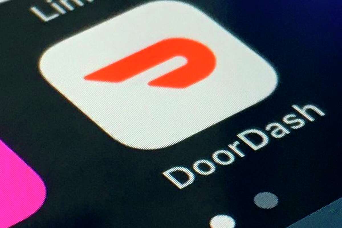 The DoorDash app is shown on a smartphone.