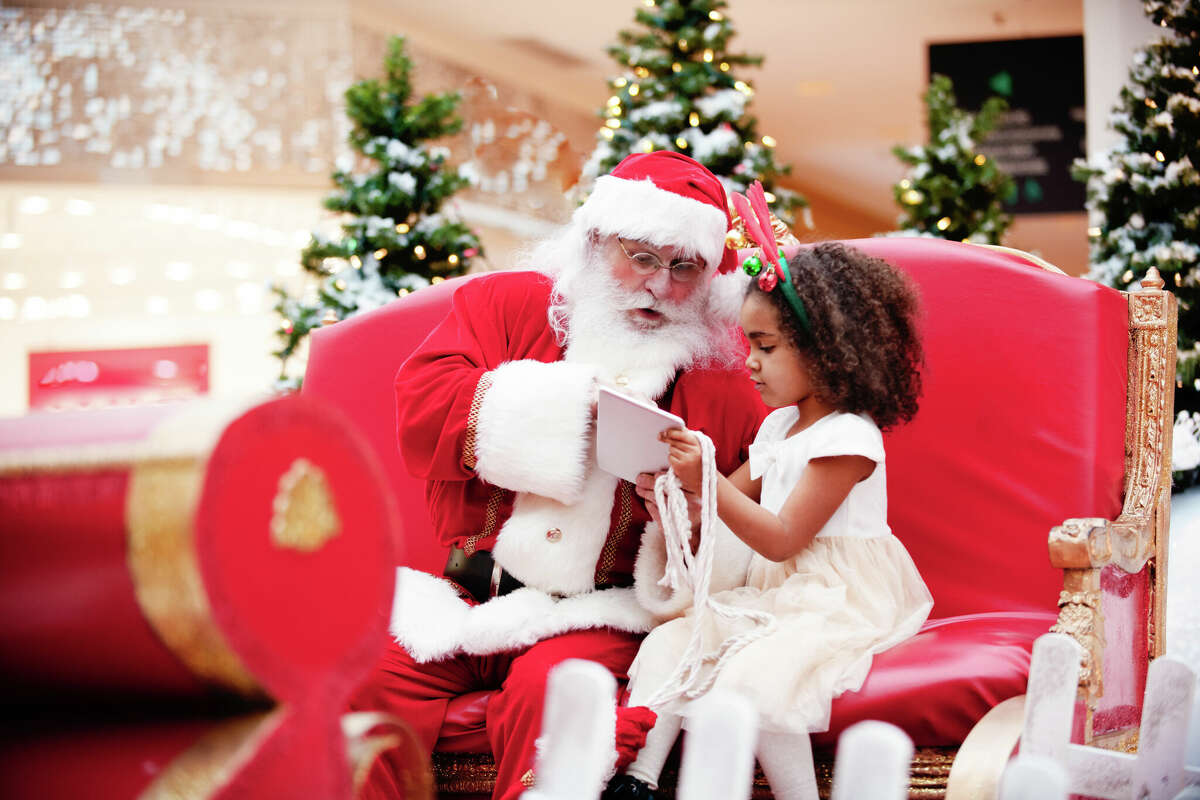 Girl tells Santa her Christmas wishlist 