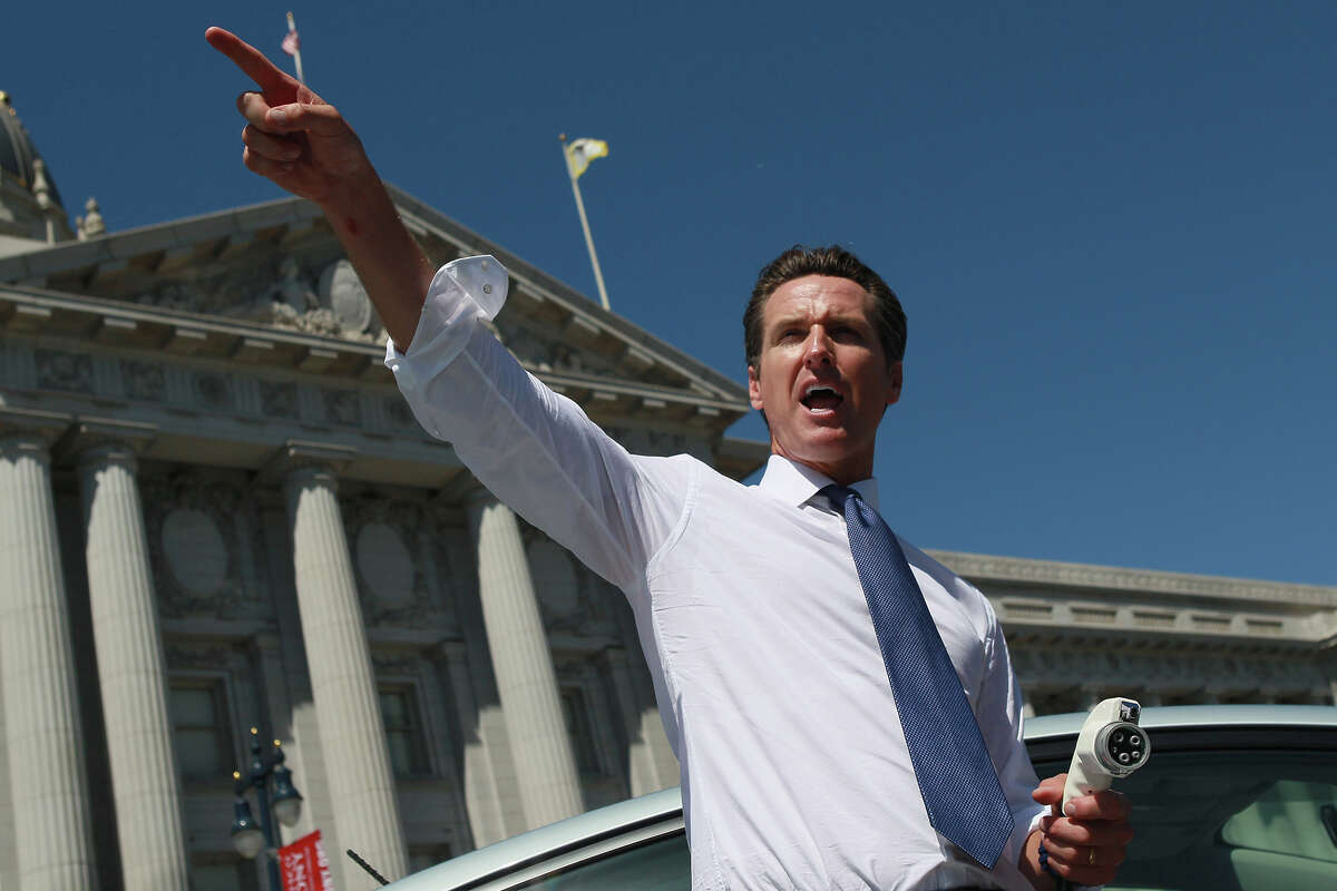 California Gov. Gavin Newsom, shown in a file photo, signed two bills last month aiming to curtail catalytic converter theft, which will both go into effect Jan. 1, 2023.