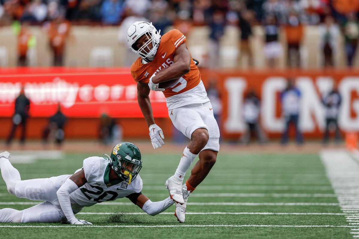 Texas running back Bijan Robinson has topped 100 yards in 11 of the Longhorns 12 games this season.