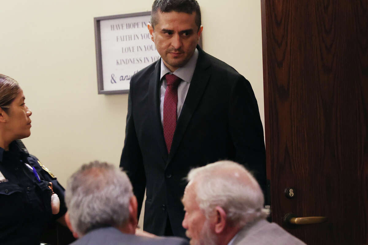 Former U.S. Border Patrol supervisor Juan David Ortiz arrives for day three of his capital murder trial before Webb County State District Court Judge Oscar J. Hale, Wednesday, Nov. 30, 2022. Ortiz is accused in the murders of four women in September 2018. He is facing life without the possibility of parole if found guilty. The trial was moved from Laredo to San Antonio due to publicity. The prosecution started presenting the jury with the 10-hour interview with Ortiz shortly after his arrest.