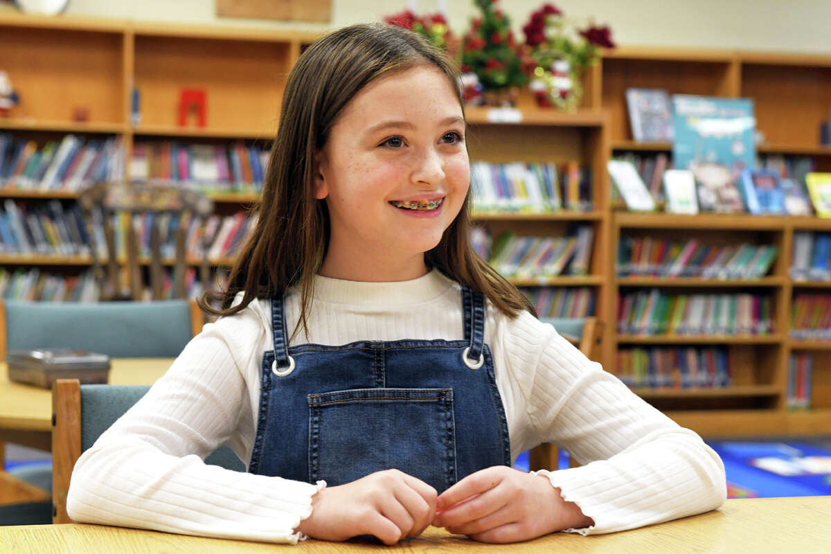 Liliana Magazine, a fifth grader at Meadowside Elementary School, speaks during an interview in Milford, Conn. Nov. 30, 2022. Magazine has been appointed to The Connecticut Democracy Center’s 2023 Kid Governor Cabinet.