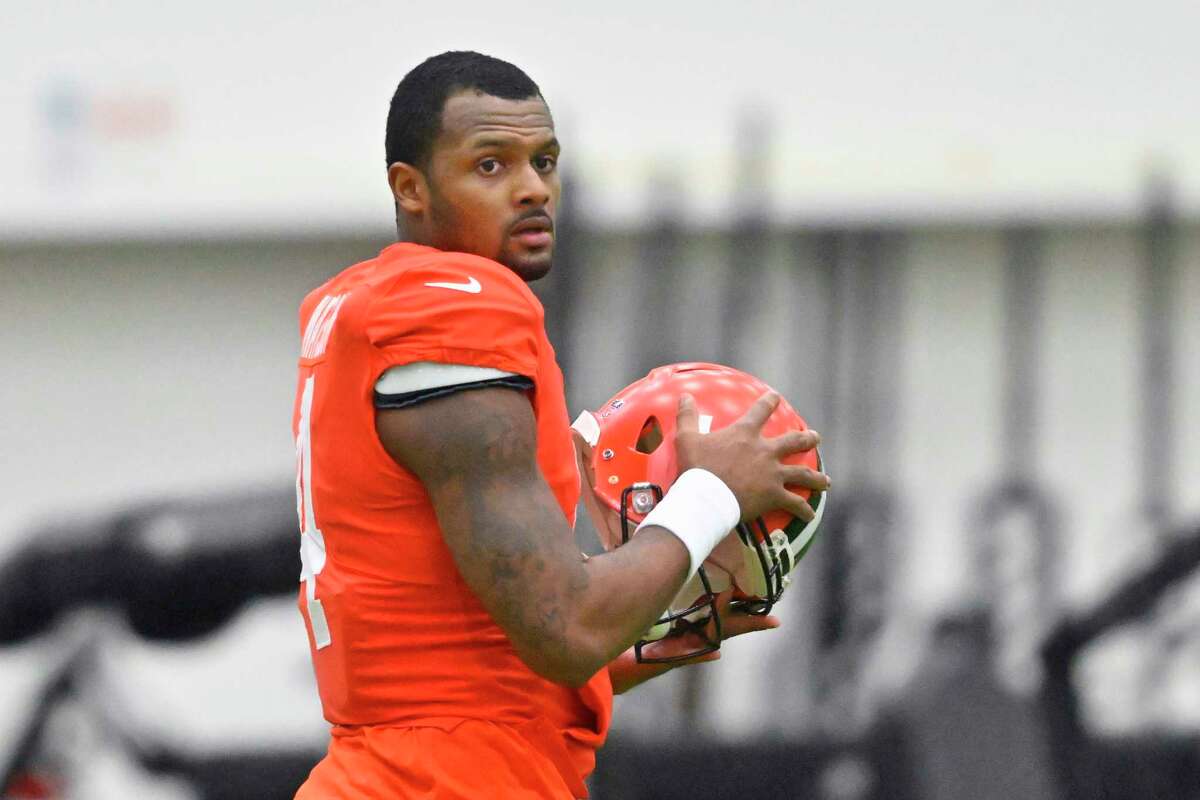 Cleveland Browns quarterback Deshaun Watson stands on the field during an NFL football practice at the team's training facility Wednesday, Nov. 30, 2022, in Berea, Ohio.