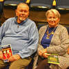 Rich and Laurie McCoy, who have been a fixture of the Jacksonville-area theater scene for four decades, inside the Illinois College Sibert Theater with programs from some of their favorite productions.