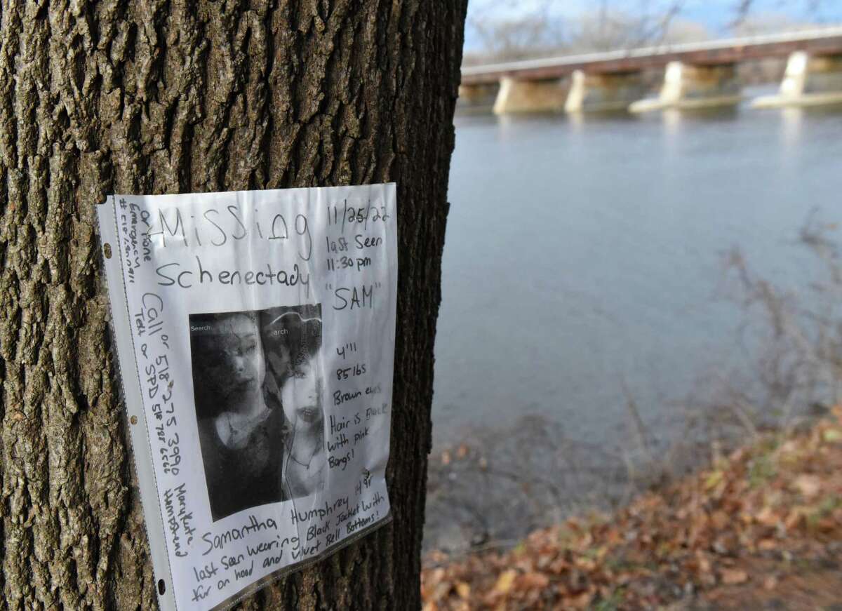 A poster for missing teen Samantha Humphrey was left by the Mohawk River where police divers are searched in an area under a railroad bridge near Riverside Park on Thursday, Dec. 1, 2022, in the Stockade neighborhood of Schenectady, N.Y. A vigil will be held both on and off social media for Samantha 9 p.m. Wednesday, Feb. 8. 2023.