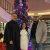 Daisy Campos Rodriguez was sworn in as District II councilmember by Roberto "Bobby" Quintana -- Justice of the Peace Pct. 2 Pl. 1, left -- at Laredo City Hall Monday, Nov. 28, 2022 while alongside husband Vidal Rodriguez, the outgoing councilmember.