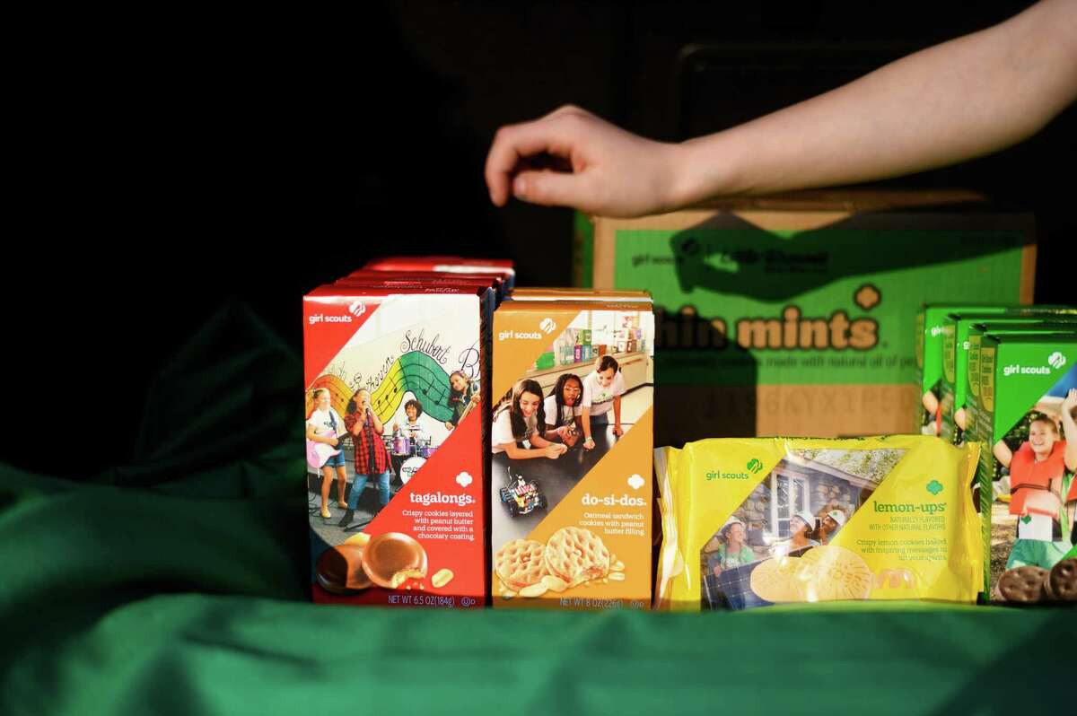 Girl Scout cookies on display in 2022. The 2023 season is off to a bumpy start due to production issues at a Kentucky bakery.