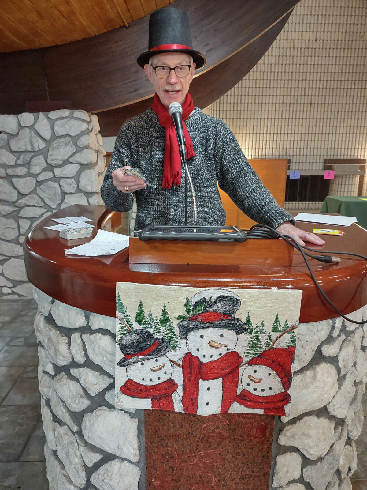 Mick Szymanski was all decked out for the holidays as he took his turn as a celebrity caller for fun bingo at the senior center this week. 