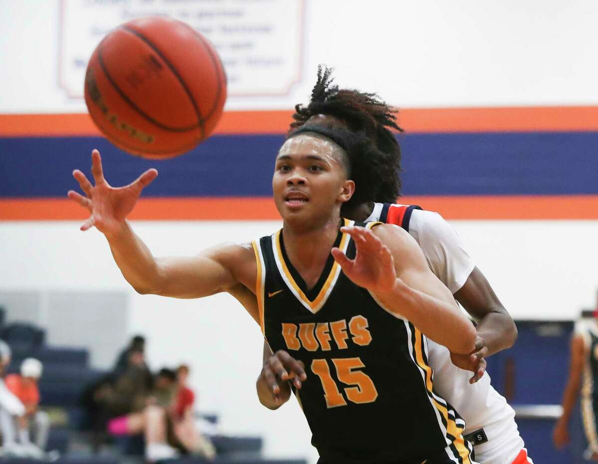 Fort Bend Marshall guard Jaland Lowe (15) catches an inbounds pass as Seven Lakes guard Nasir Price (11) fouls him in the second quarter of a non-district high school basketball game at Seven Lakes High School, Thursday, Dec. 1, 2022, in Katy.