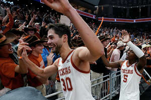 No. 2 Texas holds off No. 7 Creighton to stay perfect