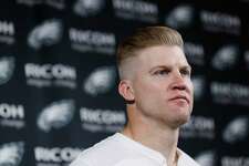 FILE - Philadelphia Eagles' Josh McCown speaks during a news conference after an NFL wild-card playoff football game against the Seattle Seahawks, Jan. 5, 2020, in Philadelphia. McCown played quarterback for 12 teams across nearly two decades in the NFL, and learned a different offense almost every season. He looks forward to sharing his knowledge and experience as a coach.