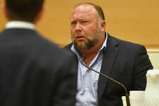 Infowars founder Alex Jones is questioned by plaintiff's attorney Chris Mattei during testimony at the Sandy Hook defamation damages trial at Connecticut Superior Court in Waterbury, Conn. Thursday, Sept. 22, 2022.    