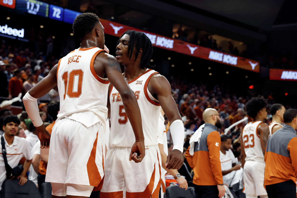 Texas guard Sir'Jabari Rice (10) celebrates with Texas guard Marcus Carr (5) after defeating the Gonzaga Bulldogs at the Moody Center in Austin, TX on November 16, 2022.