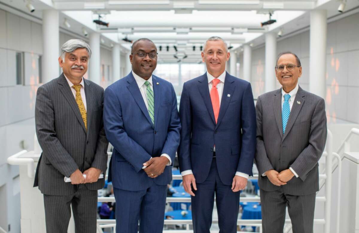 From left, Ananth Iyer, dean of the University at Buffalo School of Management; Buffalo Mayor Byron Brown; M&T CEO and Chairman René Jones; and Satish Tripathi, president of the University at Buffalo gather at a ceremony on Nov. 1, 2022 at UB, during which Jones was recognized as the 2022 Buffalo Niagara Executive of the Year.  