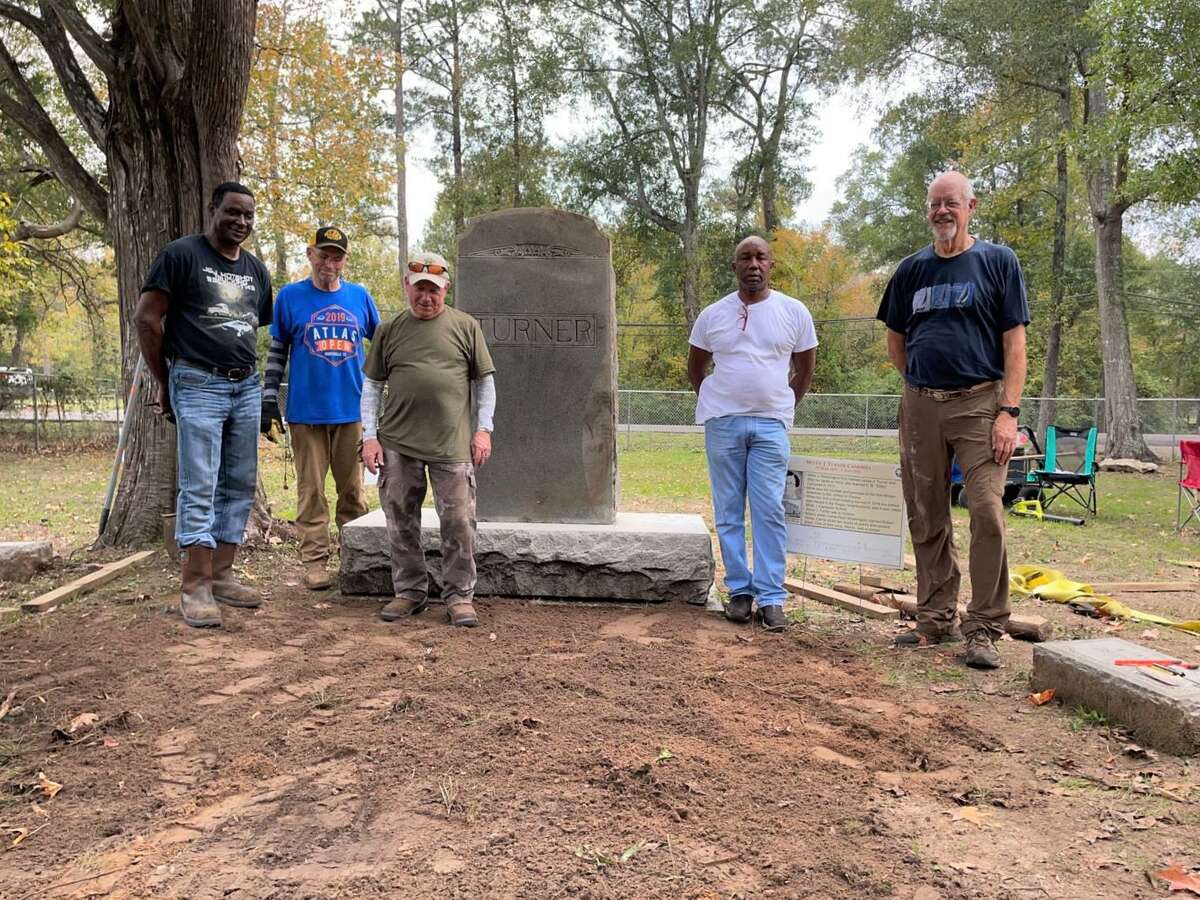 Jerry O’Neal, Tommy Cheney, Eddie Pierce, John Menefee and John Meredith standing before the monument after it was set in place.