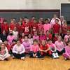 Students from Saint John Paul the Great Academy in Torrington took part in a “Pink Out Day” and raised $1,000 for the Cancer Care Fund of the Litchfield Hills.