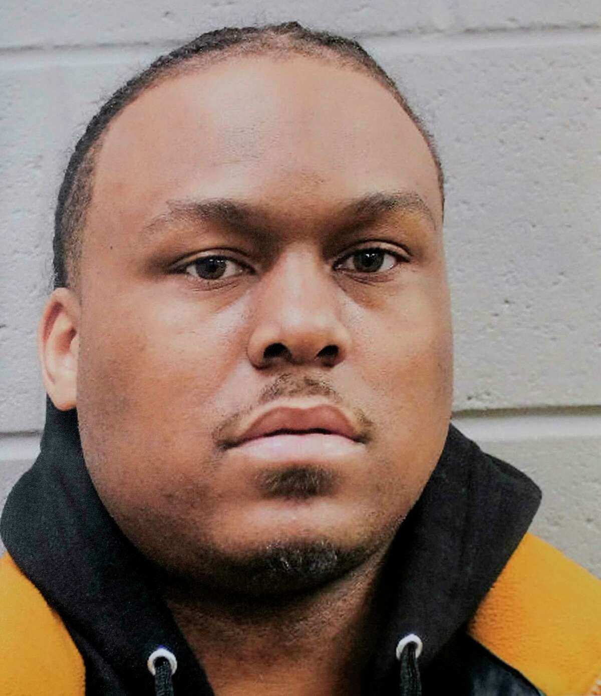 A booking mug shot of Patrick Xavier Clark, 33, is shown during a news conference announcing his arrest in connection with the fatal shooting Kirsnick Khari Ball, who is also known as Migos rapper Takeoff, on Friday, Dec. 2, 2022 in Houston. Clark has been charged with murder in the case.